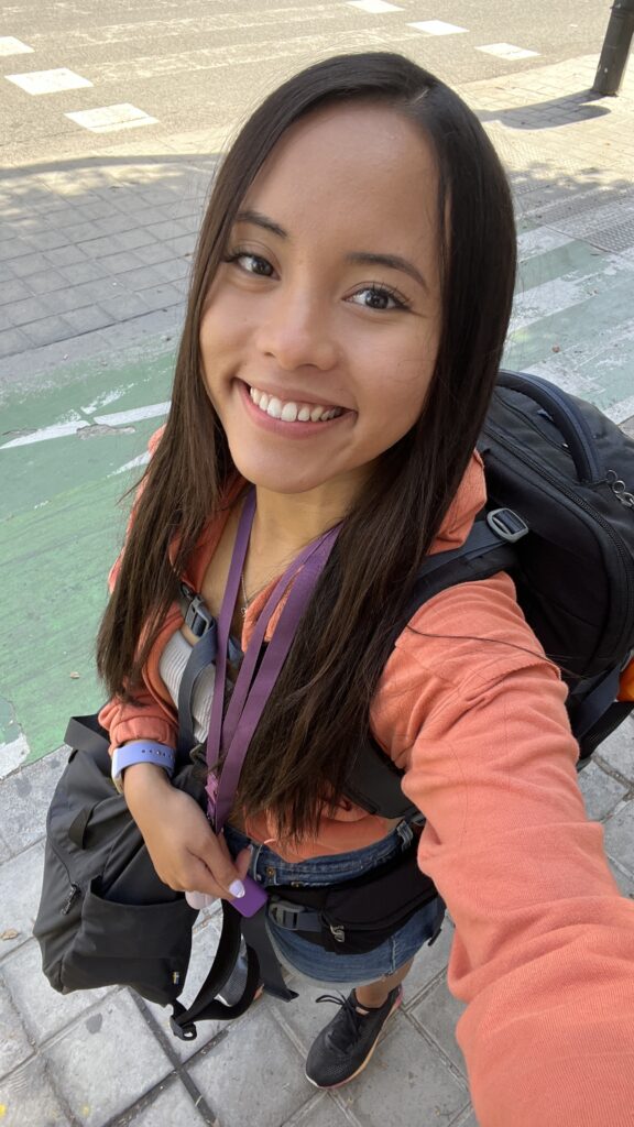 Pauline takes a selfie wearing her trusty 40L backpack.